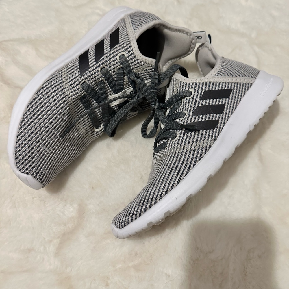 Gently worn Adidas. Gray and white pin stripe. Size 8.5